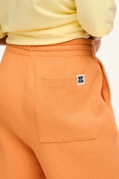 Lucy & Yak Larson - Wide Leg Waffle Cotton Joggers in Sunset Orange Sale